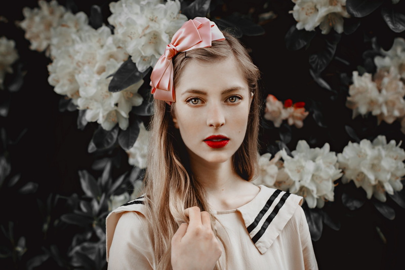1080P, looking at viewer, fiery eyes, red lipstick, hair bows, flowers, sailor uniform, women, brunette