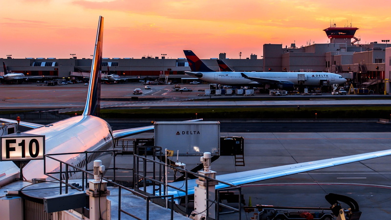 tarmac, built structure, south, warm, no people, 4K, water, airline, nautical vessel, airplane, building exterior, sky, sun, airport, nature, outdoors