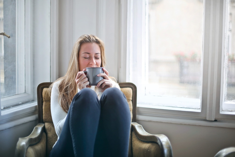 indoors, arm, tea, Home, young adult, jeans, day, closed eyes, caucasian, Young, wooden, gray, cup, coffee - drink, blond, women, holding, smell the coffee