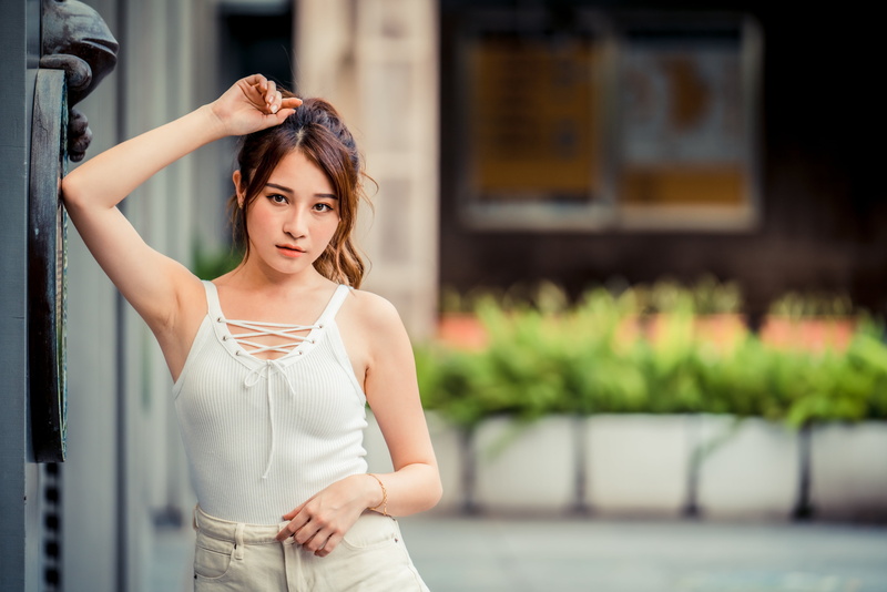 armpits, 4K, Asian, looking at viewer, flowerpot, model, depth of field, brunette, white shirt, bracelets, long hair