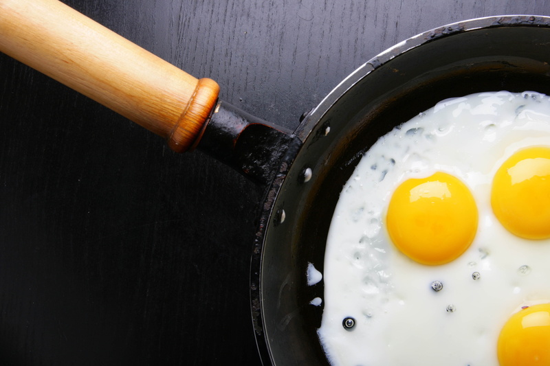 indoors, three, skillet- cooking pan, sunny side up, egg Yolk, domestic Kitchen, 4K, gourmet, black background, omelet, wellbeing, yellow, cooked, black