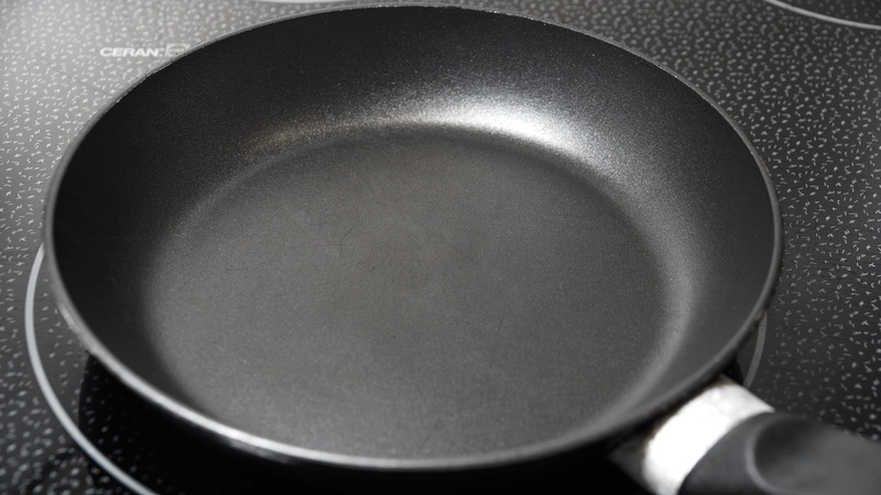 cooking pan, frying, frying pan, stove, nonstick, metal, black color, cooking, kitchen utensil, high angle view, geometric shape, single object, household equipment