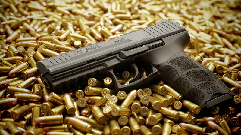 gold colored, security, communication, social issues, sign, crime, indoors, metal, violence, handgun, no people, warning sign, threats, bullet, close-up