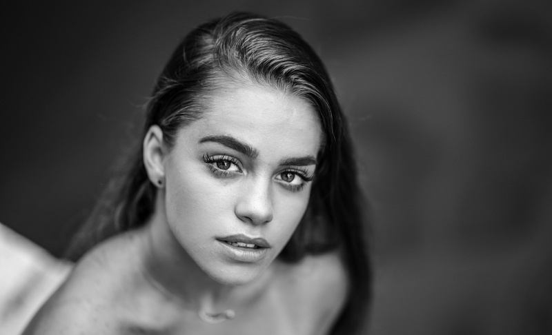 hairstyle, human body part, beauty, human face, black background, adult, serious, depression - sadness, women, beautiful woman, young women, front view