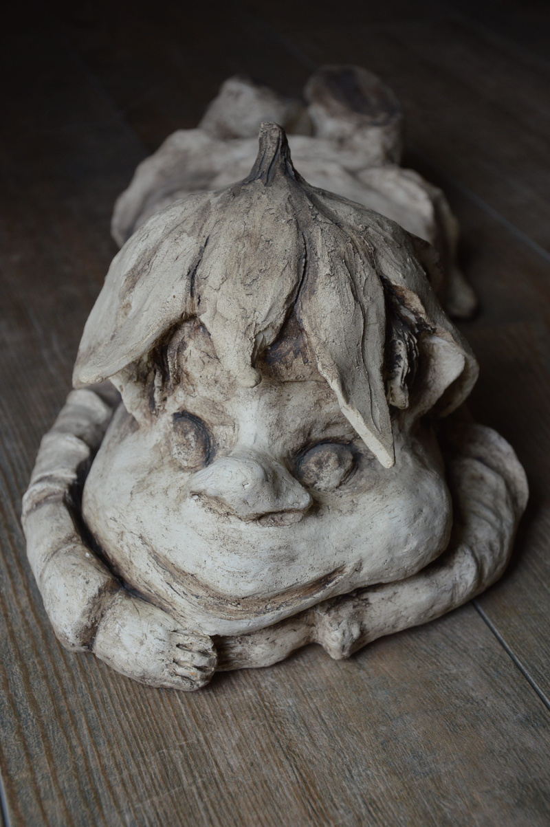focus on foreground, close-up, lion - feline, Face, human representation, wood - material, cat, representation, 4K, Ceramic, day, Statue, craft, indoors