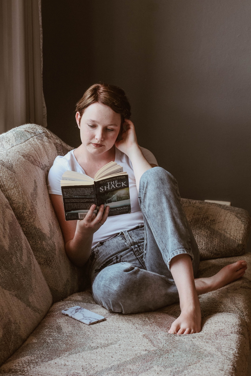 full length, relaxation, feamle, bed, couch, holding, inside, looking, indoors, 5K, one person, sitting, home interior, reading, furniture, hand, woman