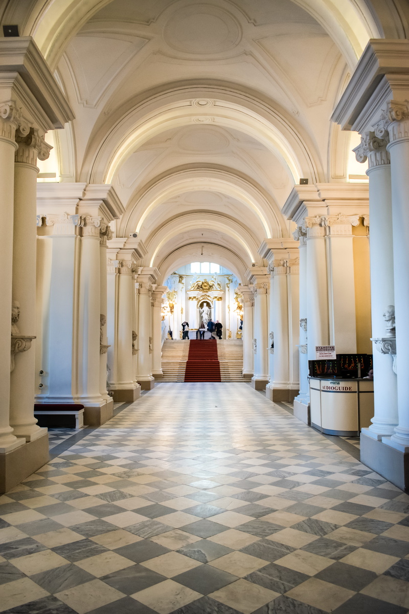 architectural column, religion, lobby, human, tiled floor, aisle, history, arched, column, hall, place of worship, architecture, floor, ornate, flooring