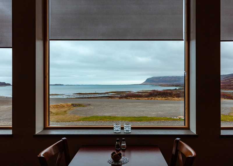 sky, restaurant, water, transparent, ocean, glass - material, cloud - sky, view, domestic room, wealth, land, landscape, sea, no people, window ledge, horizon over water