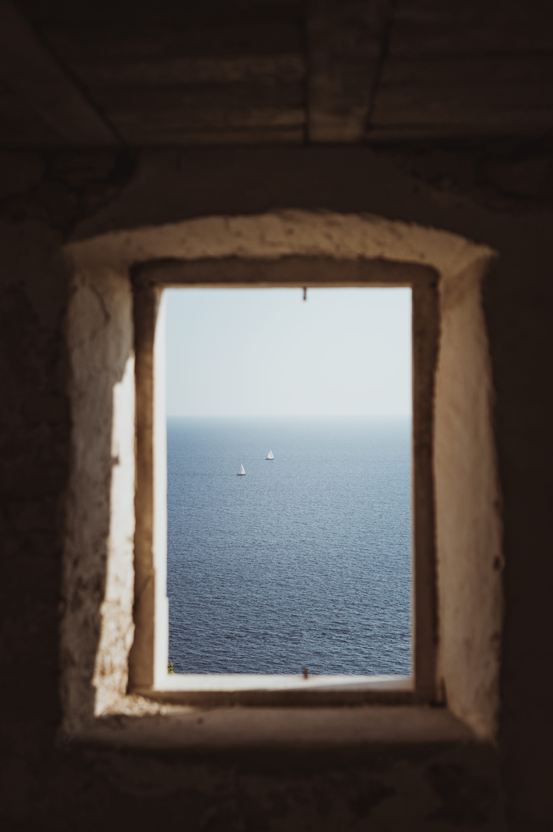 explore, scenics - nature, water, window ledge, land, indoors, horizon over water, architecture, view, daytime, two, frame, tranquil scene, nature, sailboat