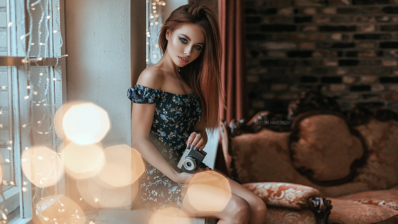 jewelry, looking at viewer, rings, christmas lights, Anton Harisov, eyeshadow, long hair, window, lens flare, window ledge, straight hair, makeup, necklace