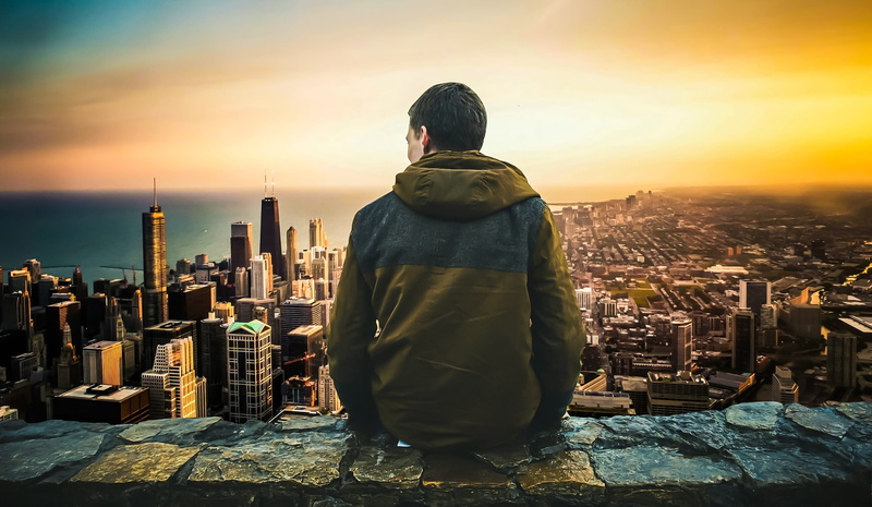 rear view, skyscrapers, high, outdoors, men, lonely, standing, nature, alone, one person, architecture, sitting, built structure, cityscape, calm, office building exterior