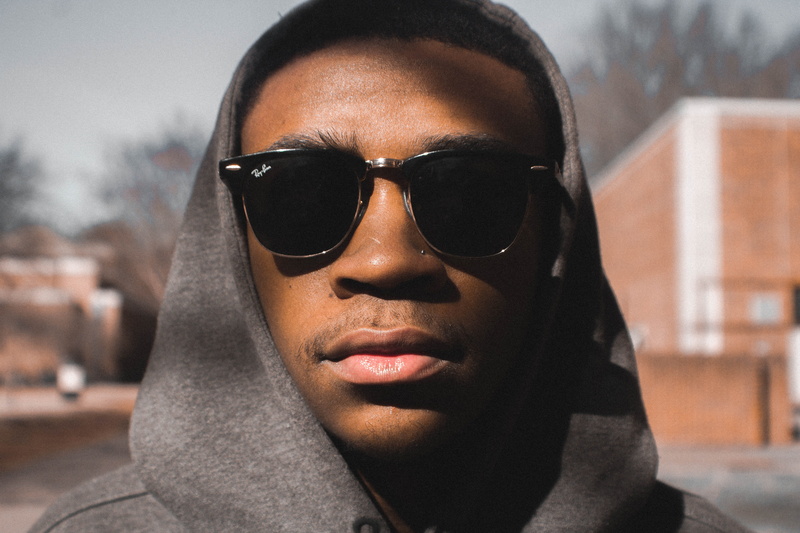 architecture, woman, black, hoodie, human body part, 5K, serious, adult, fashionable, guy, man, headshot, face, eyewear, style, fashion, looking at camera