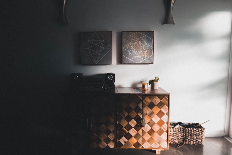room, luxury, musician, wood, design, container, brown, indoors, speaker, living room, cabinet, interior design, record player, record, candle, art, home