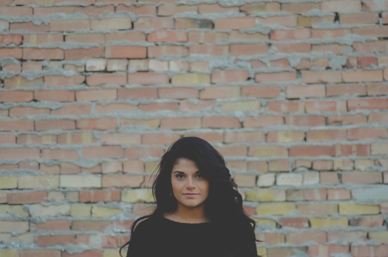 hair, brick wall, contemplation, face, people, bricks, lifestyles, portrait, bricked, model, cute, hairstyle, women, young, beautiful, brown, makeup, wears
