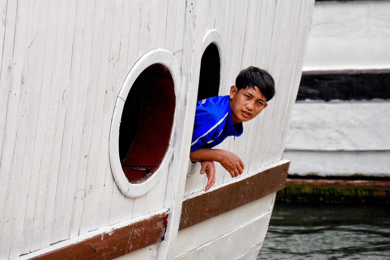 vietnam, asian, nautical vessel, ship, porthole, lifestyles, one person, person, males, looking, outdoors, window, young adult, hạ long bay, transportation