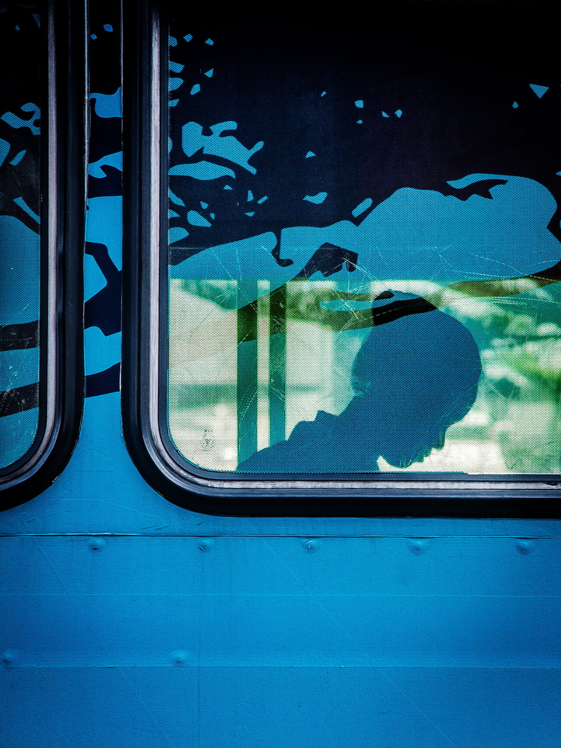 photo, nature, blue, motor vehicle, woman, reflection, public transportation, land vehicle, window, black, outdoors, 2K, glass, framed, mode of Transport