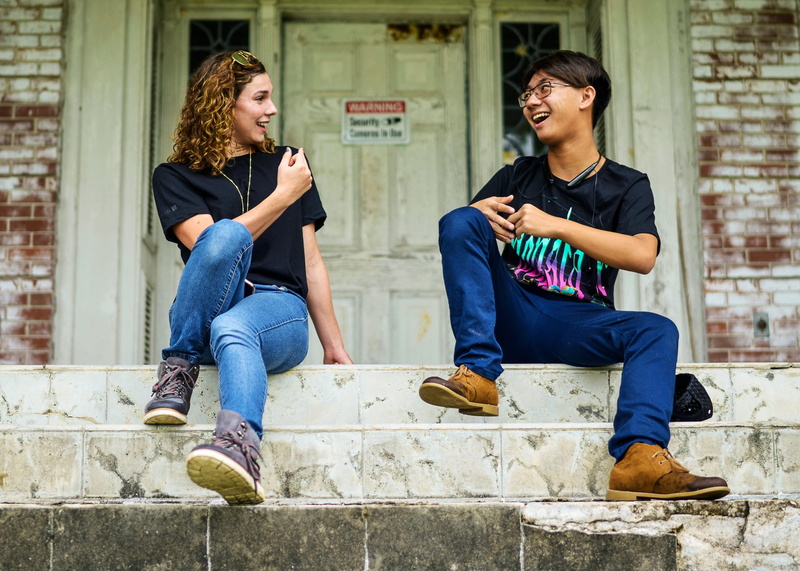 pants, white, outdoors, building exterior, jeans, architecture, adolescence, apparel, girl, young men, emotion, city life, child, teen, clothing, blonde