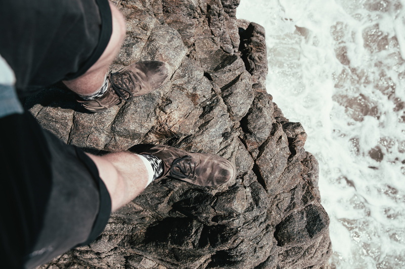 person, background, stone, day, outdoor, 2K, lifestyle, human body part, sea, legs, jeans, one person, human hand, nature, relax, feet, real people, Rock