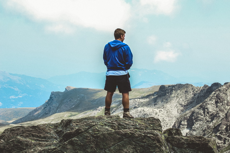top, solid, rock, dom, clouds, scenics - nature, mountain, real people, mountain hiking, recreation, mountain climber, hoodie, wear, blue, mountain range