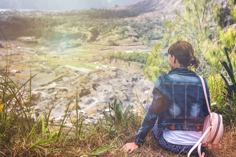overlooking, hike, one person, explore, flora, real people, enjoyment, open, three quarter length, adventure, scenic, woman, sunlight, cliff, leisure activity