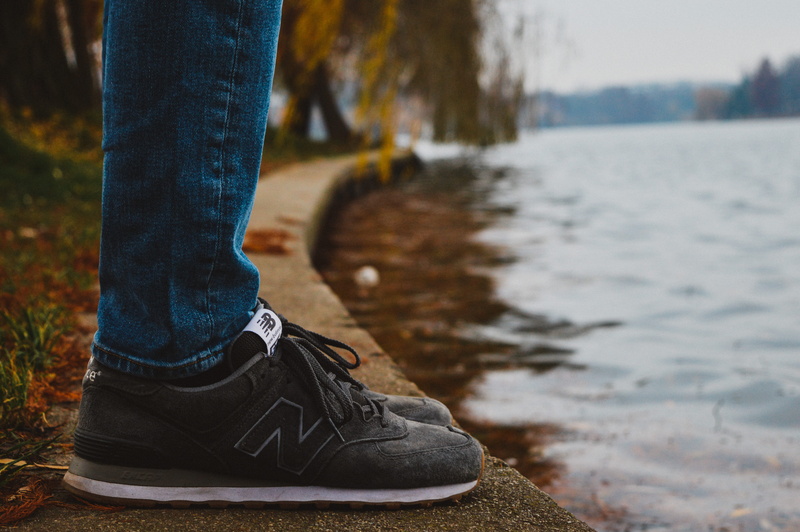 jeans, water, beside, shoes, limb, shoe, leisure activity, wearing, body, human leg, trainers, denim, near, real people, person, new balance, body part
