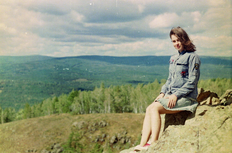 sky, freedom, casual clothing, one person, daytime, sitting, nature, 1080P, green, tree, adult, rock, leisure activity, cloud - sky, near, denim, ural