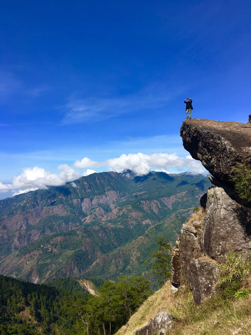 standing, rock - object, non-urban scene, nature, hike, sky, tranquility, gungal, beauty in nature, mount, cliff, forest, at the edge of, ulap, leisure activity