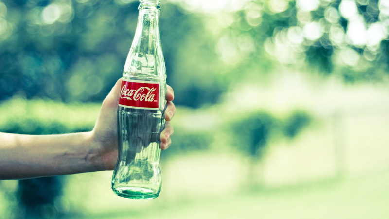 outdoors, hands, 2K, hand, body part, human hand, bottle, text, bottles, human body part, holding, day, transparent, finger, plant, nature, container