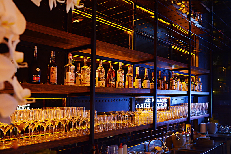 building, vietnam, order, handrail, wine, arrangement, glass, container, town, brand, glass - material, drink, human, in a row, shelf, food and drink, illuminated