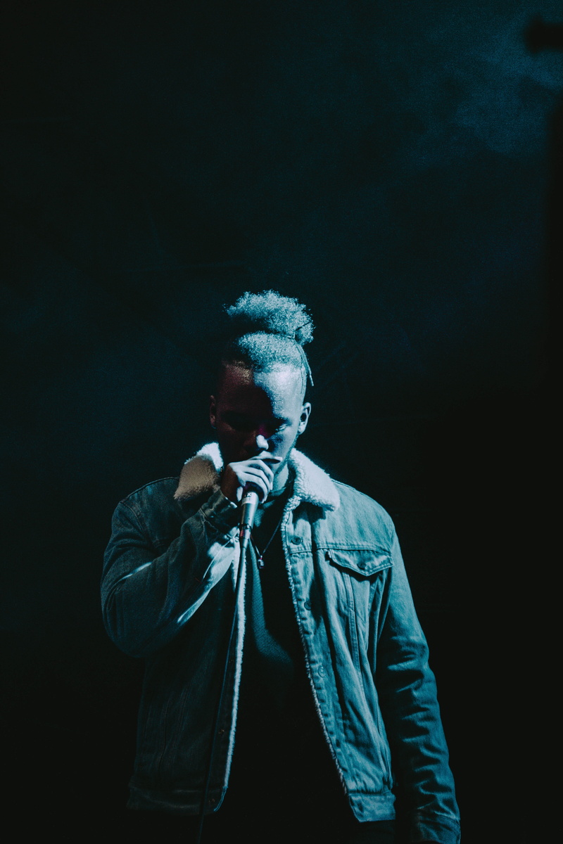 hairstyle, dark, denim, wearing, studio shot, looking, indoors, males, young men, singer, casual clothing, young adult, rap, real people, spotlight, jacket