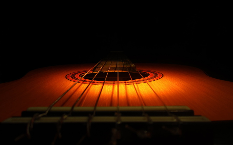 musical equipment, fretboard, no people, musical instrument string, single object, wood - material, arts culture and entertainment, Wooden guitar, classical style