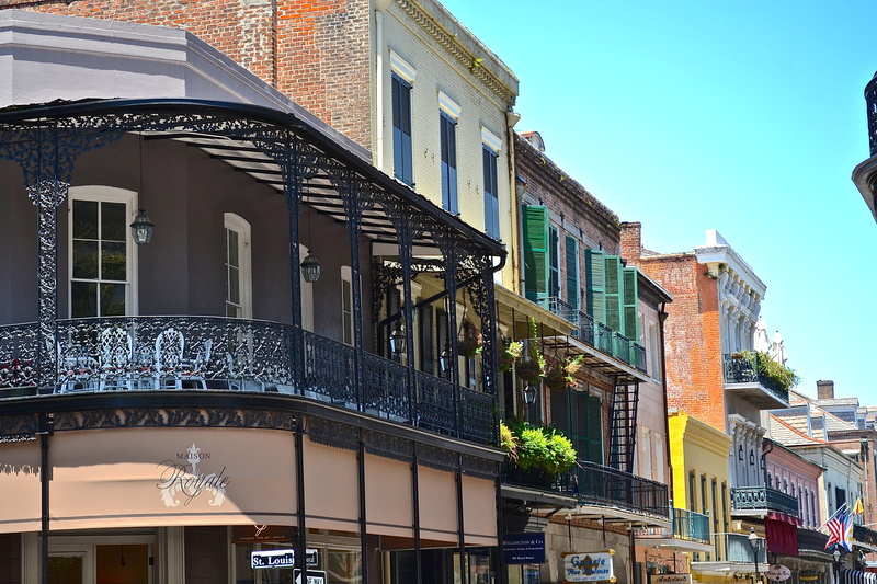 window, railing, clear sky, building exterior, residential district, sky, street, daytime, New Orleans, low angle view, Skyline, concrete, lighting equipment