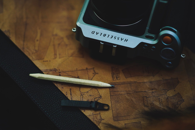 file binder, close-up, oscilloscope, wax seal, text, still life, wood - material, indoors, 4K, black, no people, camera, lcd screen, beside, hardware