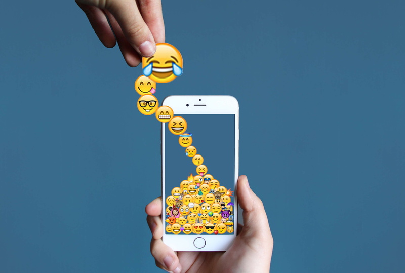 emoji, men, abstract, communication, technology, human hand, graphic, indoors, white, iphone 6, emojis, yellow, iphone, image, hand, pile, smart phone