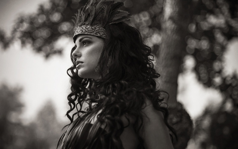 head band, women, trees, depth of field, nature, 1080P, women outdoors, profile, long hair, face, bokeh, model, brunette, feathers, curly hair, monochrome