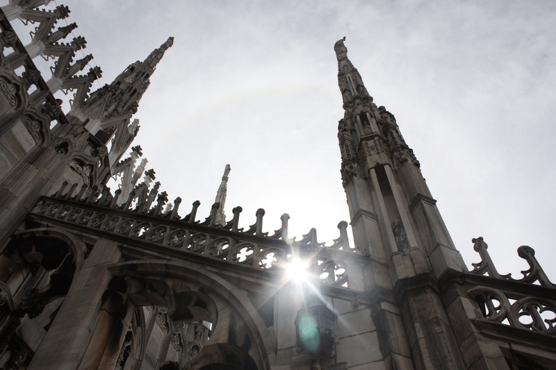 roof, belief, travel destinations, cloud - sky, lens flare, height, sky, built structure, church, tourism, gothic style, duomo di milano italy, st mary of the nativity