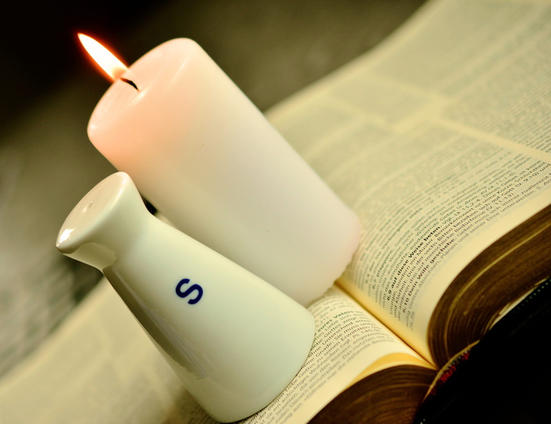 white color, focus on foreground, Bible, close-up, pillar, religion, day, education, western script, burning, salt shaker, christian, page, faith, book