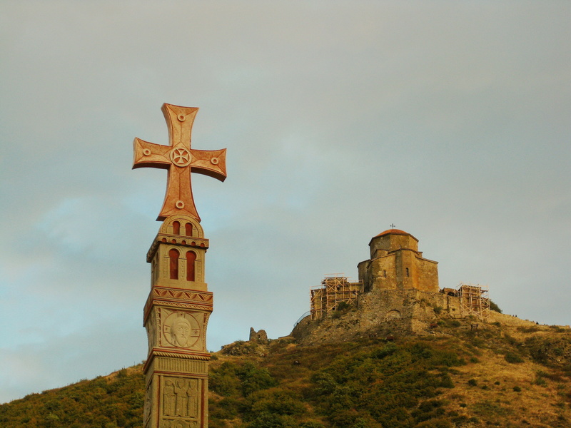 travel destinations, orthodox, cross, christianity, temple, cathedral, svetitskhoveli, place of worship, low angle view, stone, landscape, sky, architecture