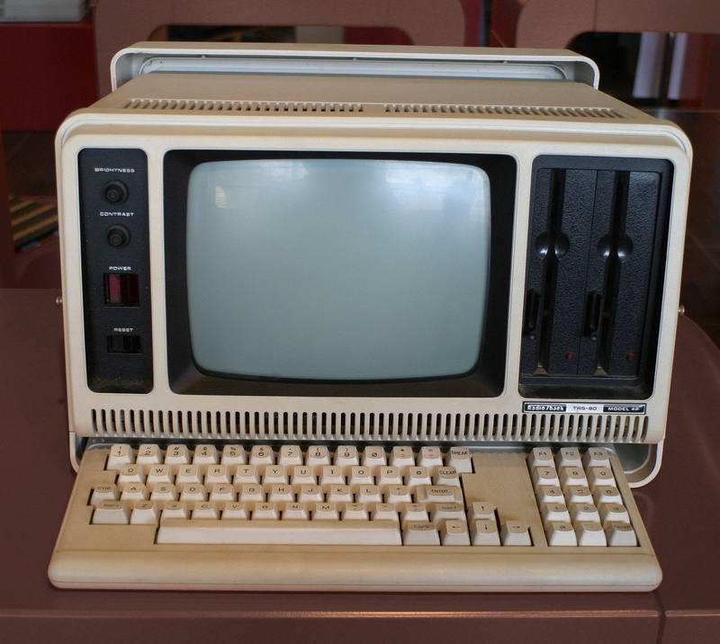 no people, table, retro styled, old, obsolete, laptop, device screen, communication, connection, 720P, indoors, computer, radio shack trs 80, wireless technology
