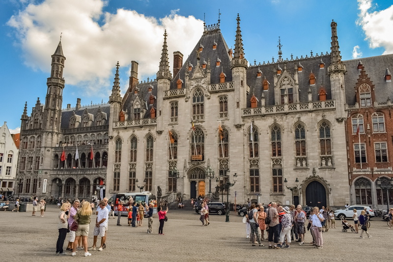 belief, group of people, cloud - sky, history, markt, sky, crowd, square, built structure, brugge, buildings, tourism, women, travel, belgium, building