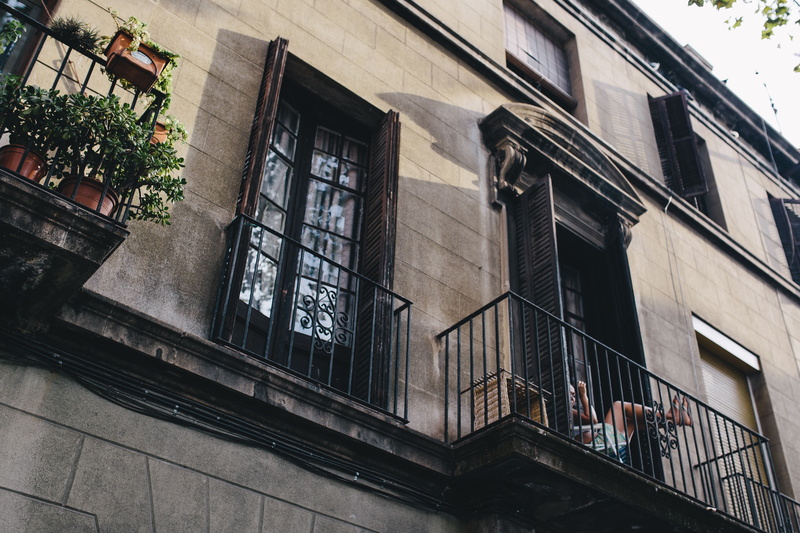 window, tree, facade, house, building exterior, railing, townhouses, outdoors, apartment, plant, location, architecture, residential district, potted plant