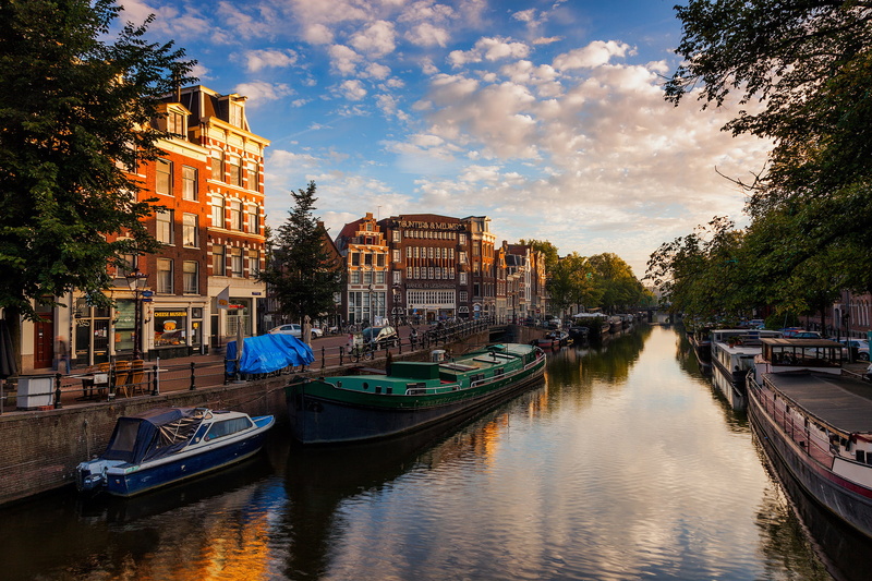 street, urban Scene, plant, amstel River, europe, famous Place, house, boats, tree, mode of transportation, town, canal, water, no people, the evening