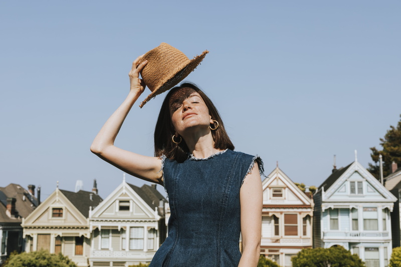 house, female, women, nature, home, front view, portrait, one person, day, urban, fashion, hat, happiness, sunlight, standing, smiling, built structure