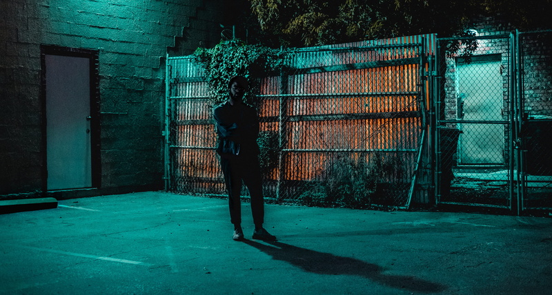 portrait, posing, barrier, light, night life, shrub, lifestyles, night, deep ellum, door, orange, x-pro2, leisure activity, architecture, boundary, security