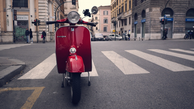 road, 4K, red, near, red vespa, crossing, street, incidental people, mode of transportation, daytime, vespa, day, pedestrian crossing, lane, moped, parked