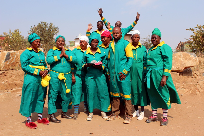mature adult, house, looking at camera, people, full length, day, women, mvuselelo, males, adult, emotion, group of people, men, zion, real people, green