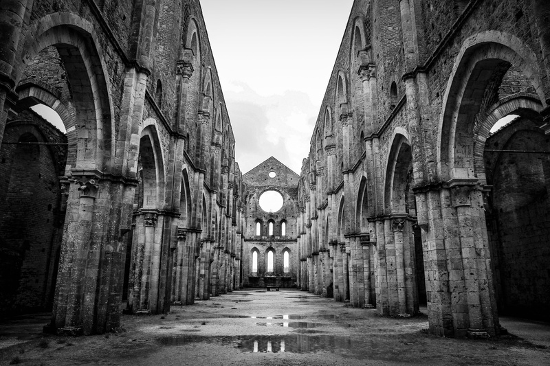 spirituality, building, black-and-white, exterior, photography, day, history, religion, historical, diminishing perspective, puddle, tourism, illuminated