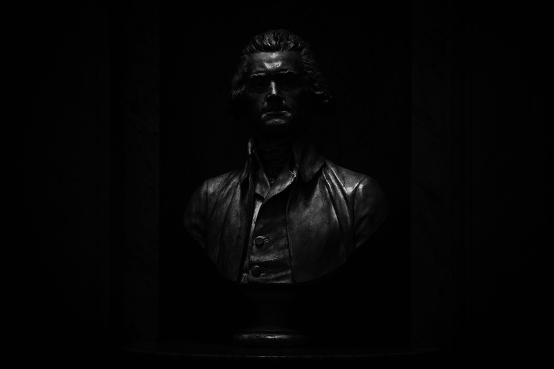 portrait, front view, serious, america, library of congress, standing, leather, monochrome, black background, studio shot, founding father, statue, patriotic
