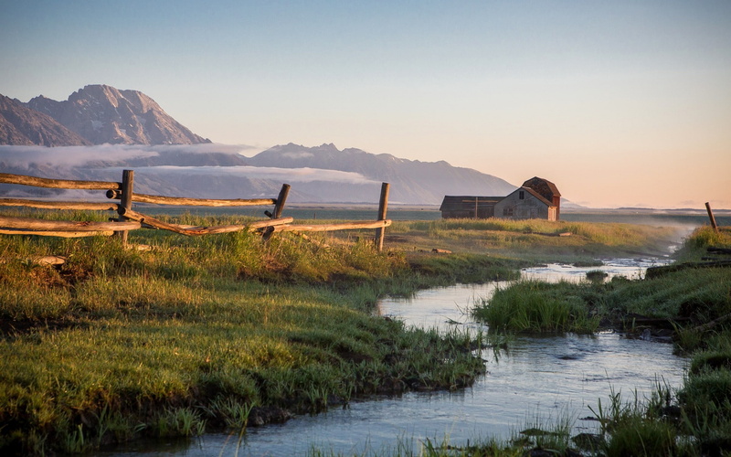 no people, outdoors, barn, tranquil scene, mountains, scenics - nature, lake, field, landscape, beauty in nature, plant, non-urban scene, grass, mountain