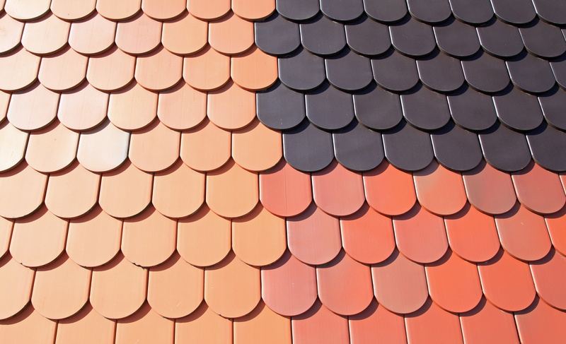 in a row, orange, brick, roof, roof Tile, abundance, black, circle, stack, roofing, red, orange color, backgrounds, indoors, close-up, pattern, order, arrangement